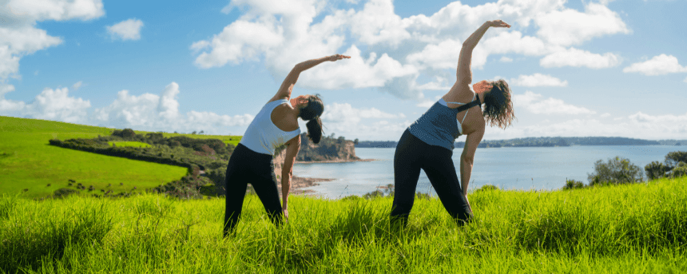 Person stretching demonstrating the mind-body connection through physical therapy