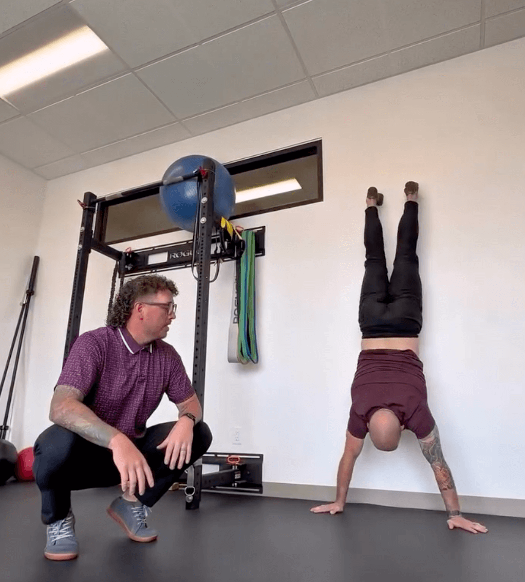 Handstand coaching with a doctor of physical therapy at PhysioFIT in Bend, Oregon