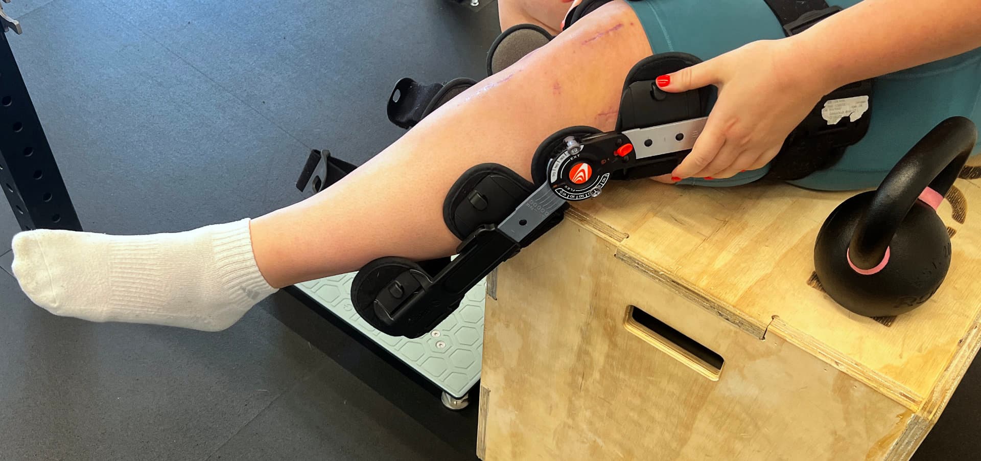 An athlete in a knee brace training for return to sport after ACL surgery in Bend, Oregon